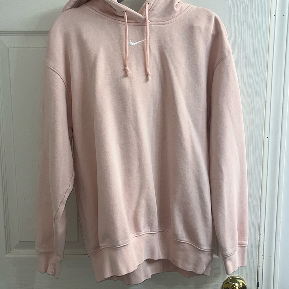 Baby pink nike hoodie size small.